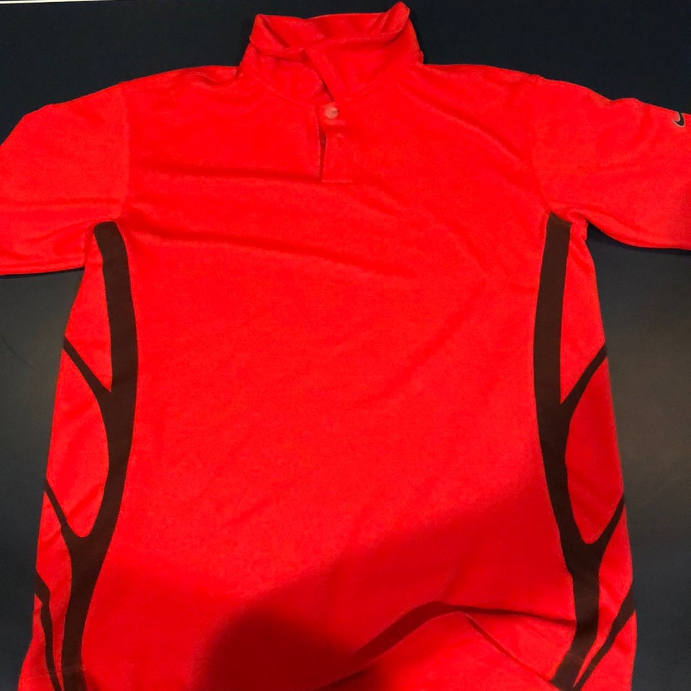 Red and black kids Nike golf shirt